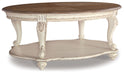 Realyn - Oval Cocktail Table - White / Brown - Albert's Furniture (Wayne, MI)